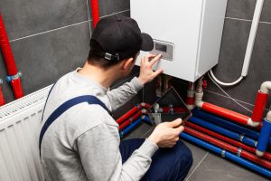 Home inspector at work during home inspection services in Greenville, TX.